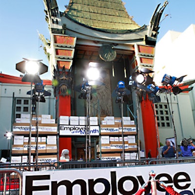 Stacks of brown boxes formed the red carpet backdrop in front of Grauman’s Chinese Theater for the Employee of the Month premiere.