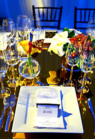 Caterer Akasha served dinner on square plates, with simple white linens.