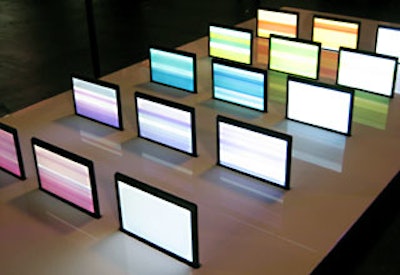 By touching the tips of a series of clustered metal rods rigged to 15 laptop computers, showgoers could create sound and abstract patterns with Limiteazero’s Laptop Orchestra.