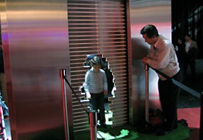 Showgoers lined up to check out Tanaka Seisakusho’s E-Taf Automatic Door, composed of a series of parallel horizontal strips each equipped with infrared sensors. As each person approached the door, the bars slid open—forming a portal shaped in the outline of that person’s body.