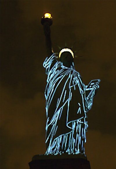 Pasteur placed four projector towers in front of and behind the statue, and to the left and the right of it, creating a 360-degree light show.