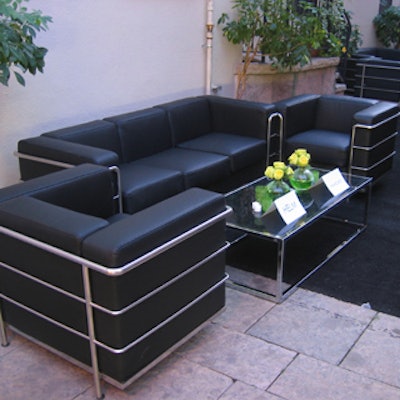 Chrome accents jazzed up the black leather lounge furniture from Signature Rentals.