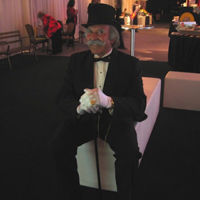An actor portraying Monopoly mascot Rich Uncle Pennybags strolled among the guests.