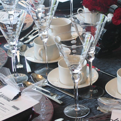 White cups and saucers and playful glass stemware from Chair-man Mills countered the gloom with a balancing sense of hope and optimism.