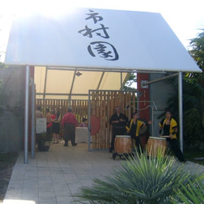 The entrance of Ichimura Miami-Japan Garden was a white tent with three Japanese symbols, under which guests were welcomed by performers from Fushu Daiko.