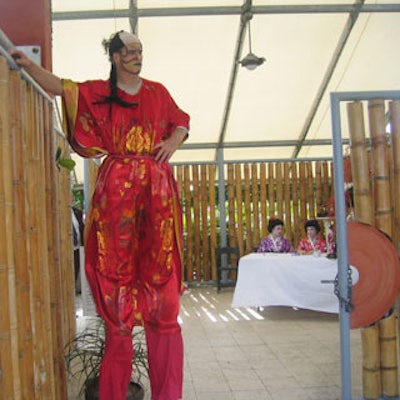 Suman Group's Paul Anderson wore many entertainment hats throughout the night, such as greeting guests while on stilts.