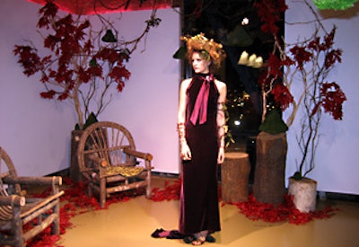 A model, with hair and body accessories made of twigs, stood in the Bavarian Wild Berries vignette.