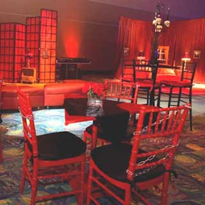 Black and red seating provided by Panache: An Event Rental Company matched the haunted look of the event.