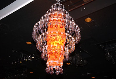 Extraordinary Events handled the decor for the tasting event at the Beverly Hilton ballroom, which included a chandelier made of wine glasses.