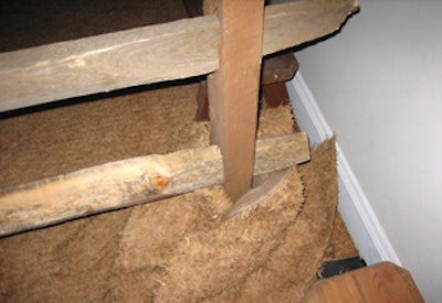 The lounge area's faux hay floor covering was bundled up around fence posts to look like small piles of hay.