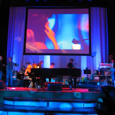 Chantal Kreviazuk performed onstage at a grand piano, while her image appeared overhead on a large screen from Westbury National Show Systems.