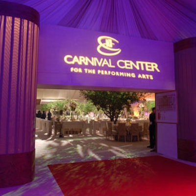 A red carpet entrance welcomed guests into the tented black tie gala celebrating the opening of the Carnival Center.