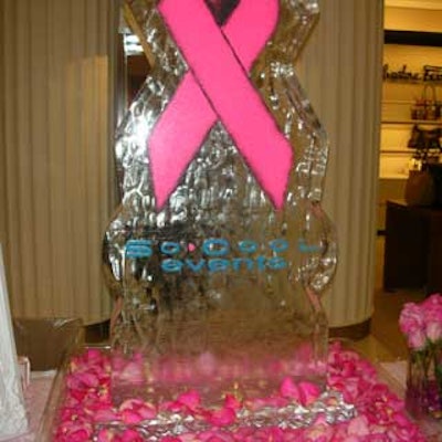 So Cool Events memorialized the event with an ice sculpture bearing the pink breast cancer ribbon, which was surrounded by clusters and vases of pink roses.