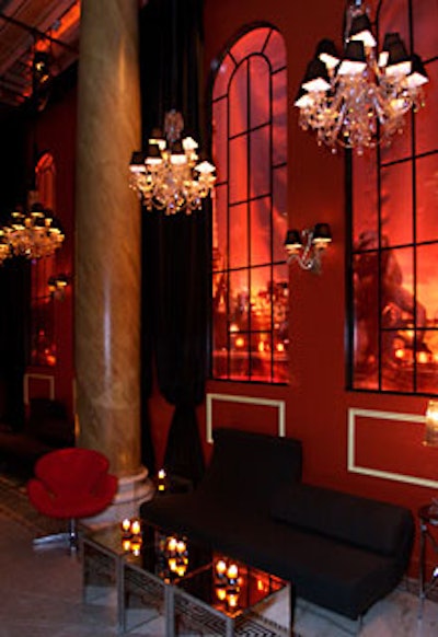 Crystal chandeliers and warmly-lit windows framing the Eiffel Tower represented Paris in Hennessy's 'world experience bar.'
