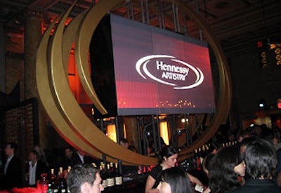 A plasma wall comprised of nine seamless screens was the centerpiece of the 'world experience bar.' Guests who preferred to linger by the bar during the concert could view a simulcast of the performances on the plasma wall.