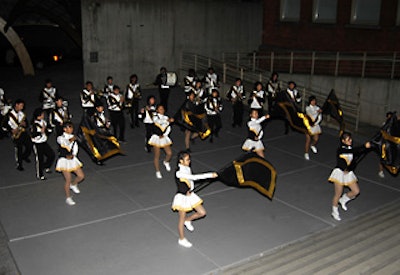 To kick off the celebration, the Francis Lewis High School Marching Band and cheerleaders put on a lively performance in the courtyard.