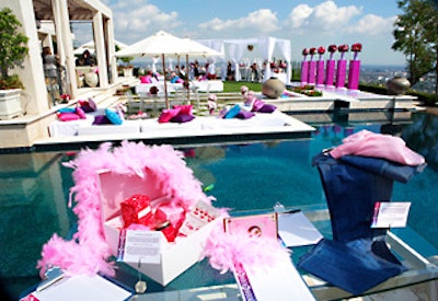 In a silent auction cabana, jewelry and yoga wear were on display to benefit the Step Up Women’s Network
