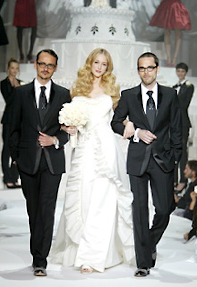 The final model to walk the runway wore a bridal gown from the collection—and tossed a white bouquet into the crowd.