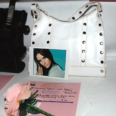Celebrities like Courtney Cox Arquette donated handbags to the silent action.