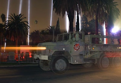 Military vehicles and personnel transported guests into the party from the valet station.