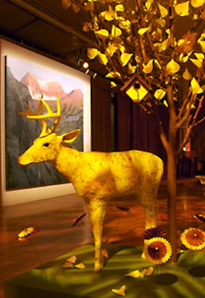 Maps cut into leaf shapes dangled from trees; maps also covered the surfaces of deer statues. In lieu of a silent or live auction during the event, artist Stephen Hannock created “Utah Canyon at Dawn,” which Sundance will auction off after the gala.