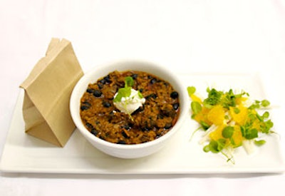 Dinner also included a bowl of beef and black bean chili and a brown paper bag filled with corn tortillas.