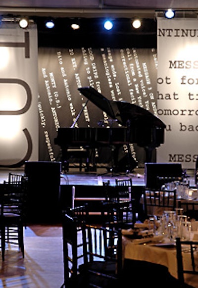 Scripts and scores adorned panels that lined the dining room, including the stage.