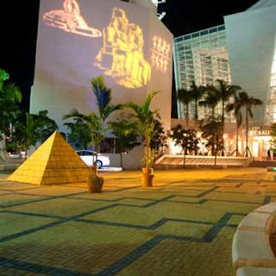 A replica of a pyramid plus Egyptian gobos highlighted the Carnival Center for the Performing Arts' outdoor courtyard for the grand opening night of Aida.