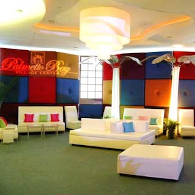 Art of the Party's suede pillow walls spanned a 52-foot area, and coupled with Room Service's all-white furniture, created a sexy and inviting lounge area.
