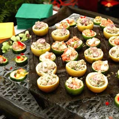 CuisineWorks presented ceviche in cups carved from lemons, limes, and cucumbers displayed on top of a square ice block.