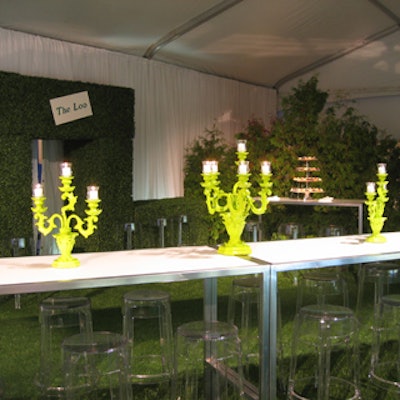 Lime green candelabras adorned the long white communal table.
