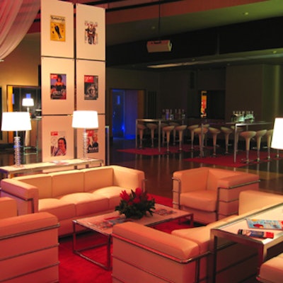 The Toronto Life-themed lounge featured red carpeting, low white chairs and sofas, and old Toronto Life covers that hung from vertical, flat displays.
