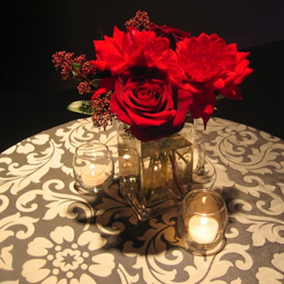 Beautiful bundles of flowers in tiny glass vases from Demarco-Perpich accented the foyer.