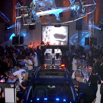 A skeletal structure of an Audi car hung from the ceiling at the Design Exchange during the museum's annual black-and-white fundraiser.