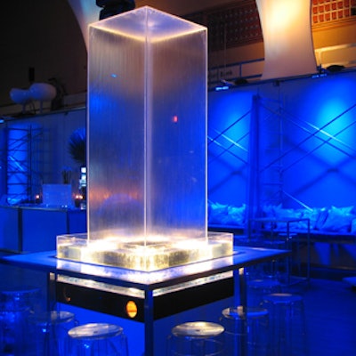 Solar Aquatics provided water column cocktail tables lit from within.