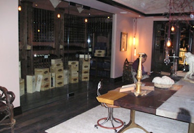 The dining room has a wine cellar adjacent to the table.