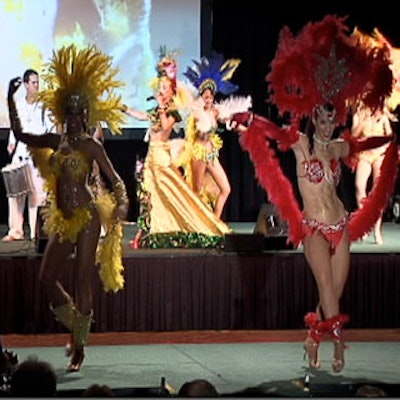 The costumes were vibrant and the percussion heavy as entertainers from Mango's Tropical Cafe performed in front of the dining crowd.