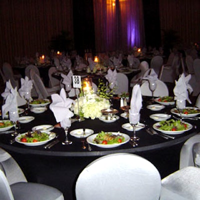 Tables were plated with a green salad topped with a grilled pear.