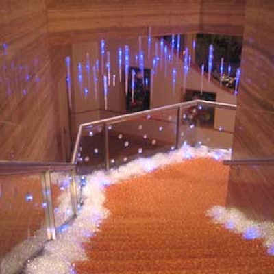 The staircase leading to the cocktail reception was lined with 'snow' and 'icicles' that glowed in blue.