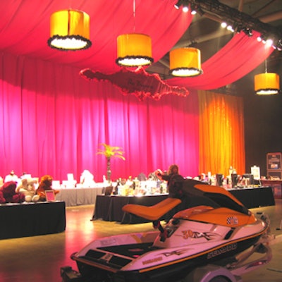 Hanging pink fabric formed the backdrop to the silent auction area.