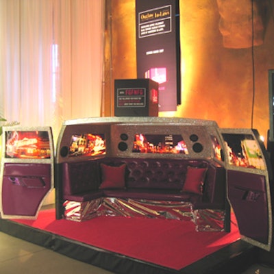 A chopped-in-half limousine with an exposed glittering interior decorated a set from which advice columnist Ellie Tesher, representing Outlaw-In-Laws, dispensed advice for getting along with the in-laws.