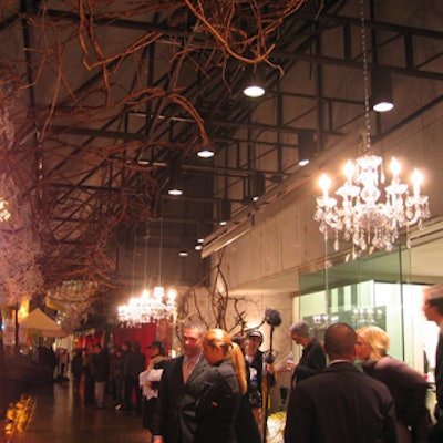 Chandeliers hung from the canopy at the front of the store, lighting the street for arriving guests.