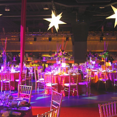 Eden Planning supplied brightly coloured dining tables topped by tall floral centerpieces for Lexpert magazine's Rising Stars, Top 40 Lawyers Under 40 gala dinner at Kool Haus.