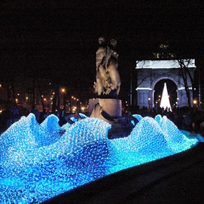 Among the most intriguing installations for the Prospect Park lighting display is the blue wave-shaped configuration in Bailey Fountain.