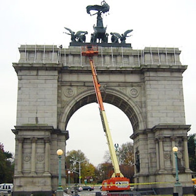 Bestek worked around and between the wires (which protect the monument from birds) atop the 80-foot-tall arch.