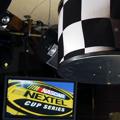 Nascar-inspired videos were projected onto the club’s walls and flat-screen TVs.