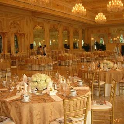 The luncheon's decor matched the lavish gold and ivory design of the ballroom at Mar-a-Lago.