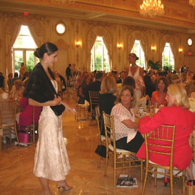 Guests got a close up view of all the designs as the models walked by each table.