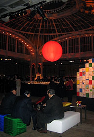 Instead of sitting at tables and chairs, guests gathered around benches and ottomans.