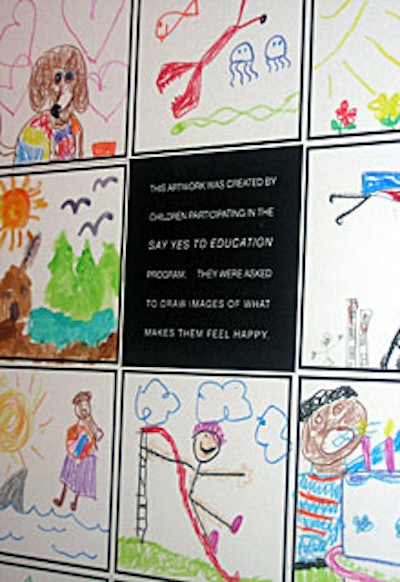 The children’s drawings depicted images of things that make them happy—everything from having fun with their families to eating pizza.